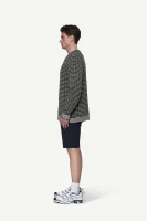 Devold Islender Refined Sweater, kolor: Ink/Offwhite - prezentacja na modelu - bok