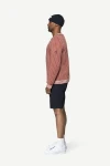 Devold Islender Refined Sweater, kolor: Marsala/Offwhite - prezentacja na modelu - bok