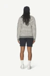 Devold Islender Refined Sweater, kolor: Raw White - prezentacja na modelce - tył