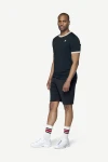 Devold Archive Ringer Tee, kolor: Ink/Offwhite - prezentacja na modelu - przód